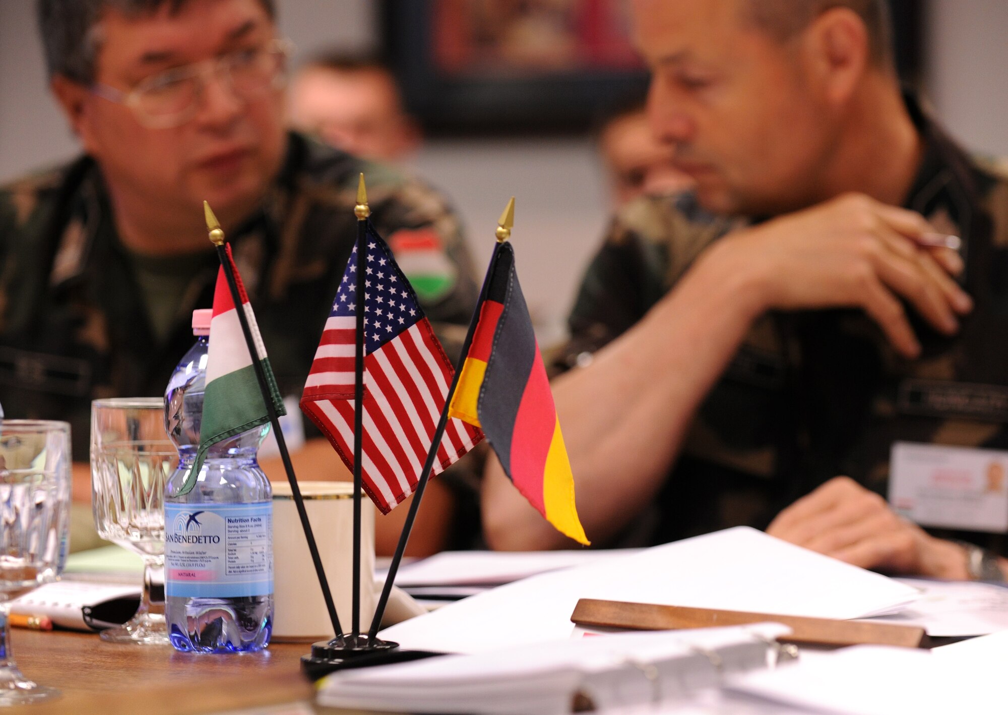 SPANGDAHLEM AIR BASE, Germany – Hungarian Defence Forces members discuss inspection topics during Conventional Armed Forces in Europe and Vienna Document 1999 treaty compliance exercises here May 3. Members of the Hungarian Defence Forces inspected the 52nd Fighter Wing as part of a trilateral training event. (U.S. Air Force photo/Senior Airman Nathanael Callon)
