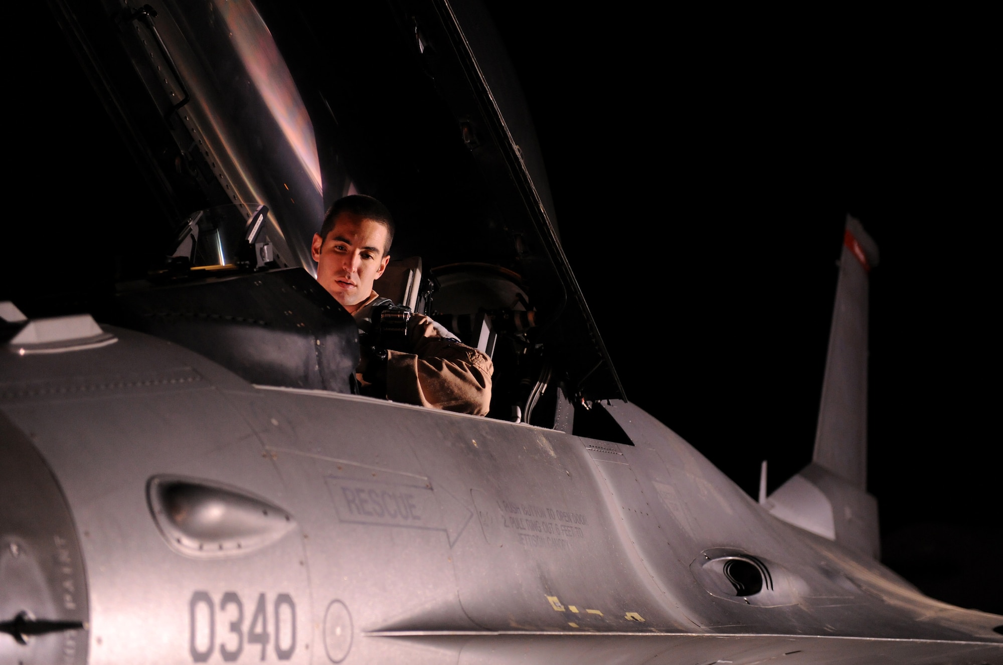 SPANGDAHLEM AIR BASE, Germany – Capt. Brett Stevens, 480th Fighter Squadron F-16 Fighting Falcon pilot, performs a preflight check here May 2 prior to departing for the unit’s Air Expeditionary Force deployment. The 480th FS deployed to Iraq in support of Operation New Dawn as part of the unit’s AEF cycle. (U.S. Air Force photo/Senior Airman Nathanael Callon)