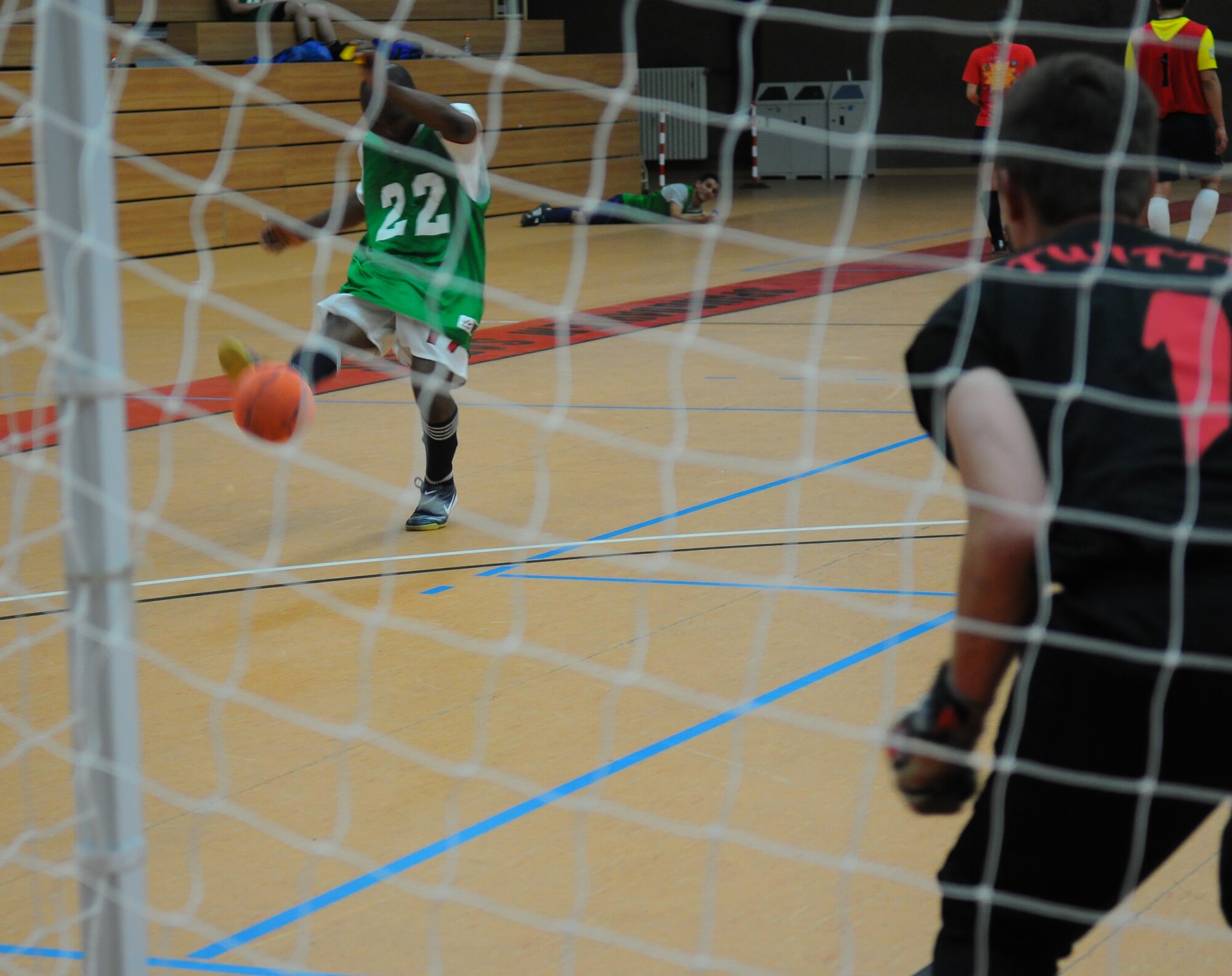 SPANGDAHLEM AIR BASE, Germany –Eric Dickson, 52nd Civil Engineer Squadron, kicks a soccer ball during an intramural soccer game at the Skelton Memorial Fitness Center here April 28. The 52nd CES defeated the 52nd Medical Group 6-2. (U.S. Air Force photo/Airman 1st Class Dillon Davis)