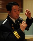 KUNSAN AIR BASE, Republic of Korea -- Chief Na Yu-In, Gunsan Korean National Police chief, addresses 8th Security Forces Squadron Airmen following a lunch at the Loring Club here May 3. Chief Na and Lt. Col. Mark Anarumo, 8th SFS commander, planned the event after they met and found a common bond in education, which they realized could benefit both of their forces. Colonel Anarumo plans to address the Gunsan City police in June. (U.S. Air Force photo/Senior Airman Ciara Wymbs)