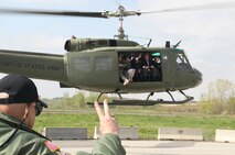 The Medal of Honor recipients ride to the bridge ceremony at Faith Community Center, Lafayette, Ind., in a UH-1 Huey helicopter. After the ceremony, the recipients flew to the Medal of Honor Bridge to cut the ribbon and open the bridge to the public.