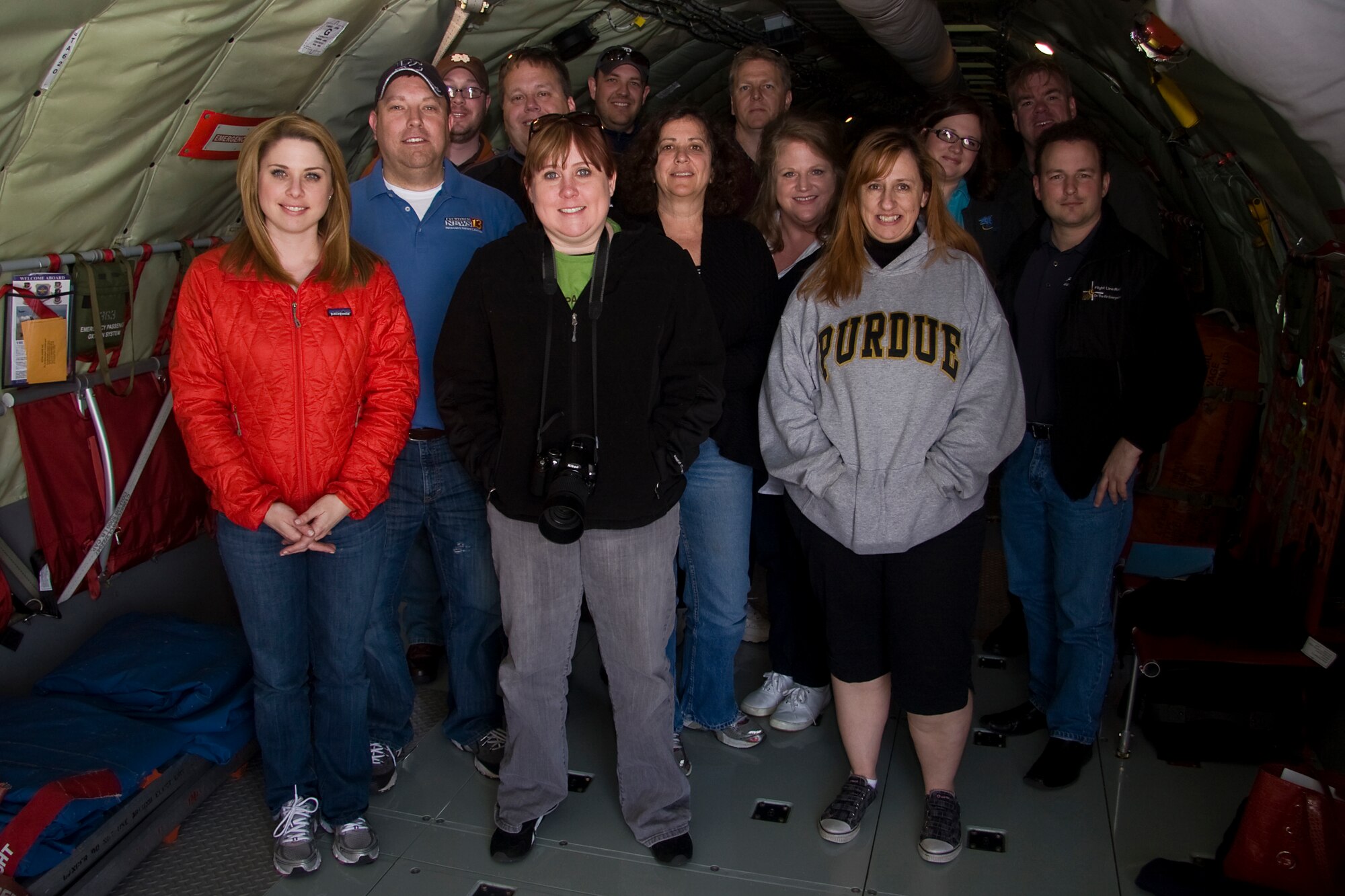 GRISSOM AIR RESERVE BASE, Ind. -- Social media representatives from around Indiana pose for a photo onboard one of the 434th Air Refueling Wing's KC-135R Stratotanker aircraft after taking part in a social media orientation flight May 5. The media representatives witnessed firsthand the aerial refueling mission of the 434th ARW as a crew from the 72nd Air Refueling Squadron refueled a U.S. Navy E-6 from Tinker Air Force Base, Okla. From left to right are Nicole Misencik, Scott Allen, Chad Pollitt, Dave Woodson, Jenell Orelup, Christopher Theisen, Lorraine Ball, Jamie Till, Amy Stark, Elizabeth Musgrave, Jessica Funk, Leilan McNally and Don Costanza. (U.S. Air Force photo/Tech. Sgt. Mark R. W. Orders-Woempner)