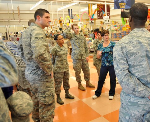 Tonya Shorter, 375th Force Support Squadron Airmen and Family Readiness Center, brief Airmen receiving basic allowance for subsistence about saving May 5, 2011, at Scott Air Force Base, Ill. Airmen living in the dorms are receiving BAS due to the renovation of the dining facility. (U.S. Air Force Photo/Airman 1st Class Divine Cox) 