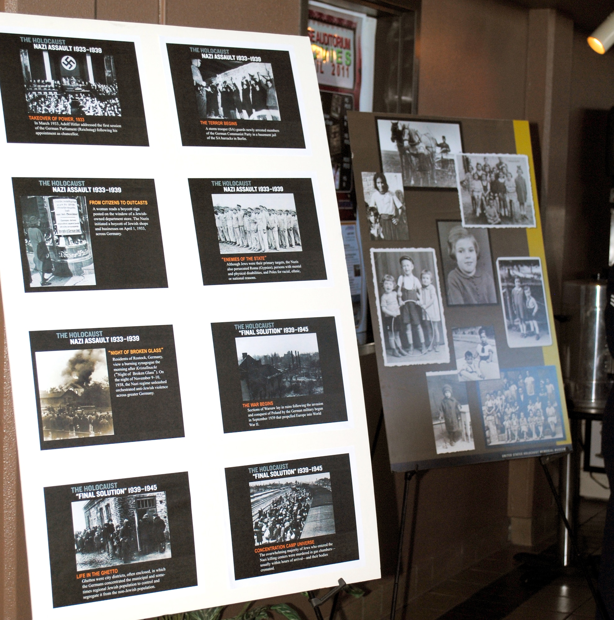 Several boards of information describing genocide and the tradegies of the holocauust were on display in the lobby of the Auditorium during the Holocause Commemoration Ceremony May 2.  The ceremony themed "Justice and Accountability in the Face of Genocide" was held to inform Malmstrom Airmen about genocide, and to honor victims of the Holocaust.  (U.S. Air Force photo/Airman Cortney Hansen)