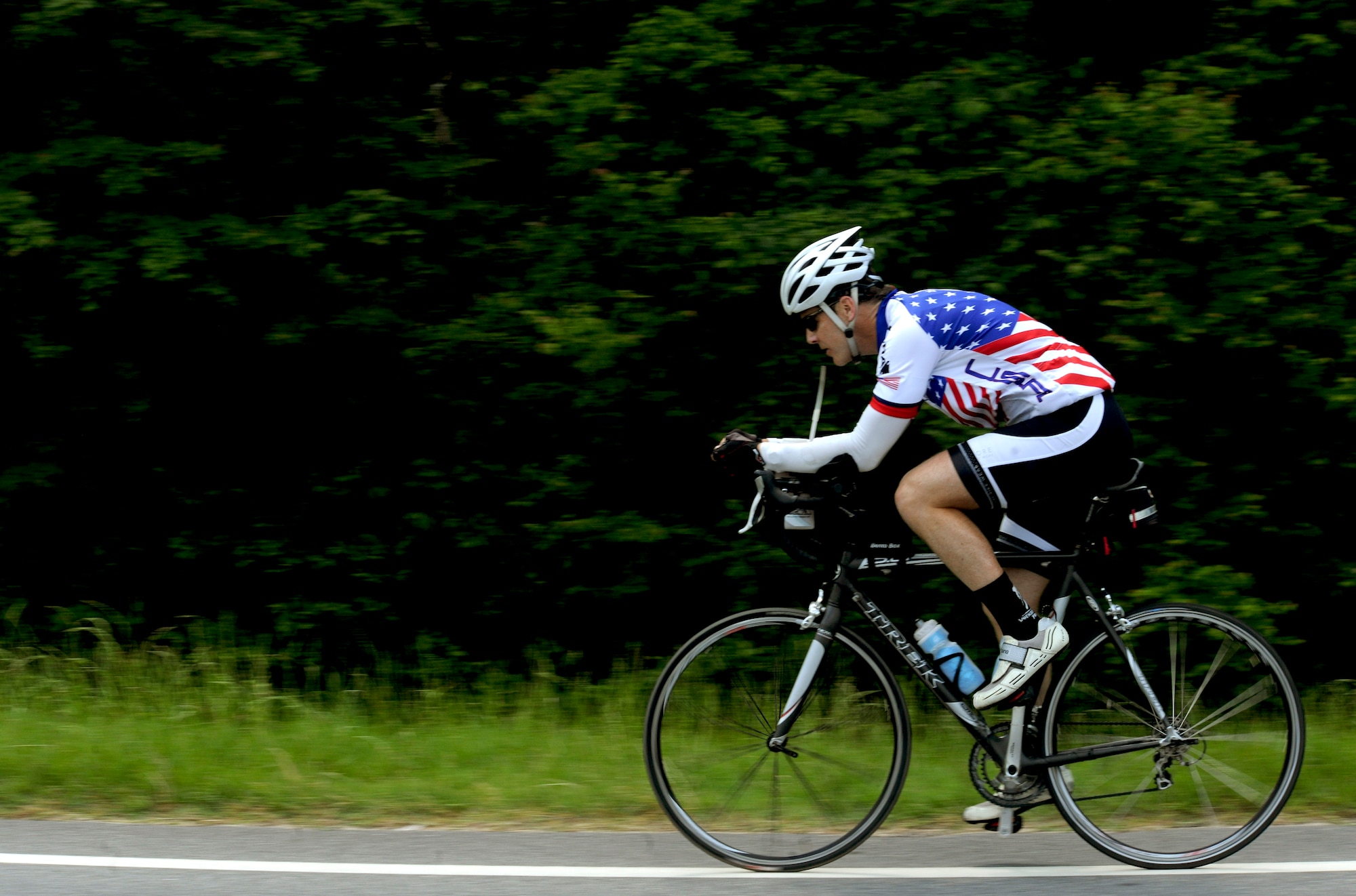 HAHIRA, Ga. -- Jason Rogers, Air Force veteran, rides his bicycle through Hahira, Ga., May 2. Mr. Rogers rode his bicycle 2,500 miles across the United States to raise money for the Wounded Warrior Project. (U.S. Air Force photo/Airman 1st Class Jarrod Grammel)(RELEASED)