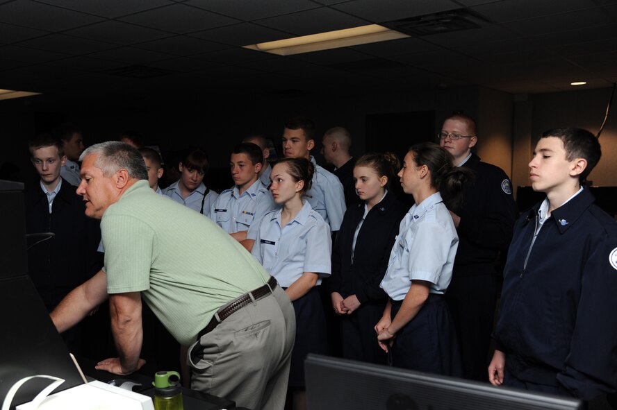 SEYMOUR JOHNSON AIR FORCE BASE, N.C. -- Mr. Brian Rockwell gives members of  McMichael High School JROTC a tour of their new facility here, May 4, 2011. McMichael High School is located in Mayodan. Mr. Rockwell is the deputy chief controller of the Radar Approach and Control and is a native of Richmond, Mass. (U.S. Air Force photo/Senior Airman Whitney Lambert) (RELEASED)