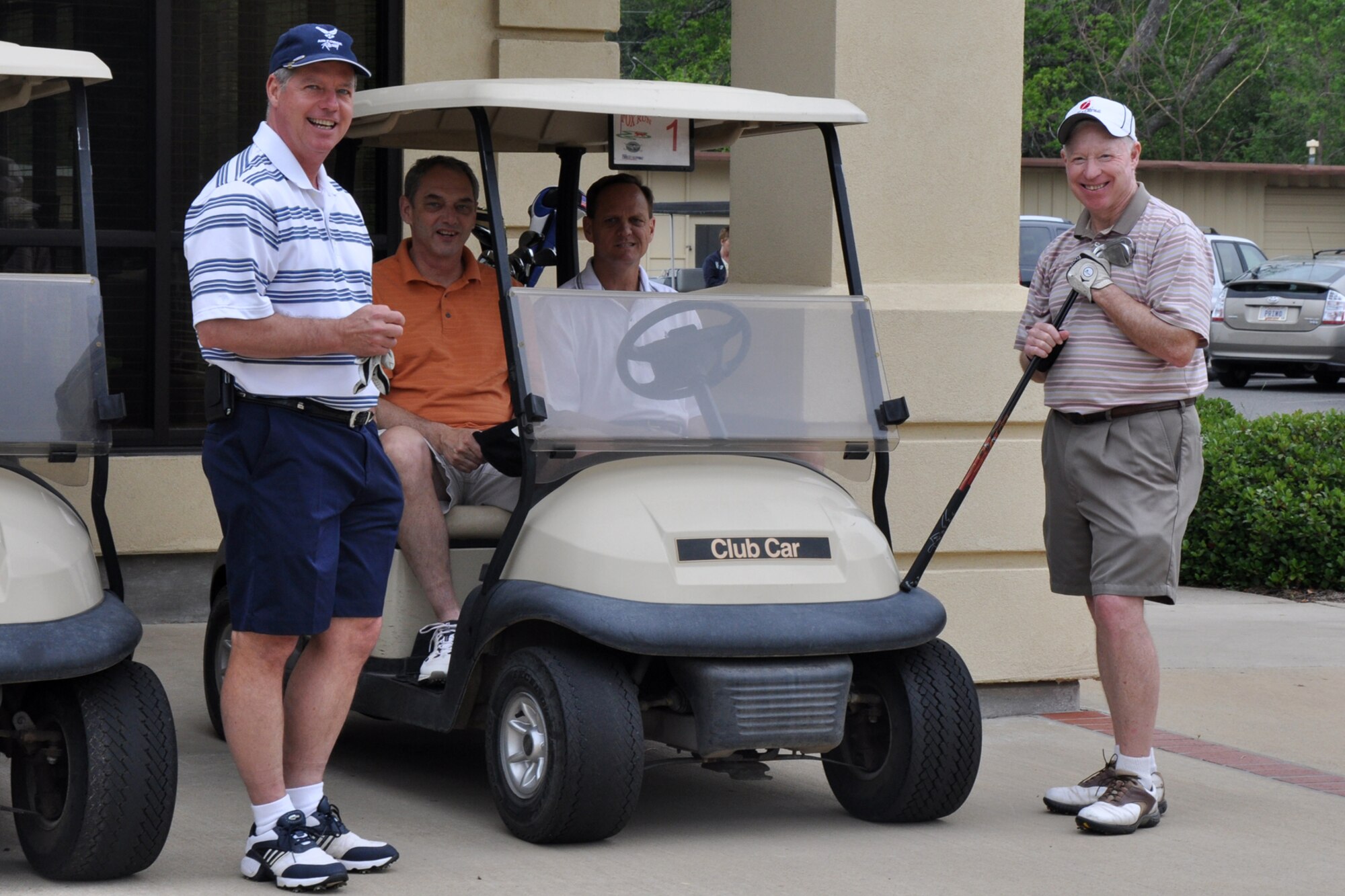 (L-R) Col. Keith Schultz, Brig. Gen. John J. Mooney III, Lt. Col. Scott Adams and Brig. Gen. (Ret) Jack Ihle wait for the start of the 307th Bomb Wing Commander's Cup Golf Tournament at Fox Run Golf Course at Barksdale Air Force Base, La., April 30, 2011. General Mooney is the 307th BW commander and this year’s host of the annual event. The golf tournament, which is combined with a family day picnic, is used by the 307th BW commander to bring family members of 307th BW Airmen together to get to know each other as one big Air Force family. (U.S. Air Force photo/Tech. Sgt. Jeff Walston) 