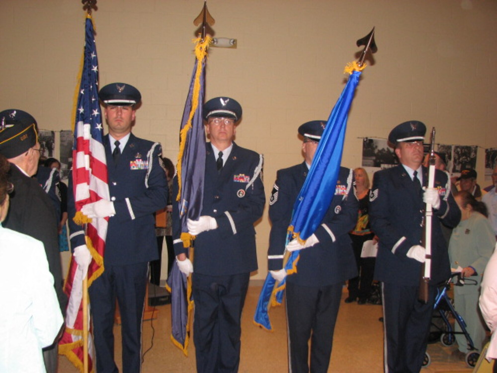 New York Air National Guardsmen from the Eastern Air Defense Sector presented the national colors at the Helen and Leon Sperling Holocaust Memorial Lecture in Utica on Monday, May 2.  This year’s lecture honored military veterans and the memory of those who perished in the Holocaust. The lecture featured Hudson Falls High School teacher Matthew Rozell, whose World II living history project has brought more than 200 Holocaust survivors together with the veterans who liberated them. The EADS honor guard, from left to right, are: Master Sgt. Tom Whiteman, Master Sgt. Jeff Lamarche, Senior Master Sgt. Don Roberts and Technical Sgt. Jim Mauthe. Not pictured is Master Sgt. Gene DeHart, who is to the left of the American flag. 