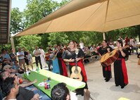 Mariachi Las Coronelas, an all-female Mariachi group, performs during the Defense Language Institute English Language Center's annual AMIGO picnic on April 29. The event offered free food and featured games and sports, music, children's activities. (U.S. Air Force photo/Robbin Cresswell) 