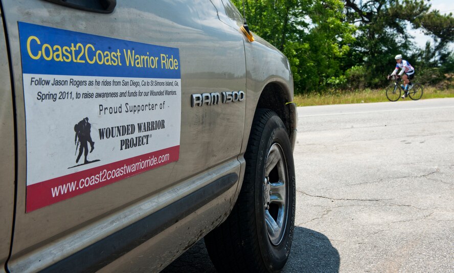 VALDOSTA, Ga.-- Jason Rogers, Air Force veteran, rides along a Georgia highway on his cross country trip for the Wounded Warrior program May 2. It took Mr. Rogers three weeks to cycle from San Diego to Waycross, Ga. He ended his journey in Waycross where friend and family were waiting to celebrate Mr. Rogers’s well-intended trip. (U.S. Air Force photo/Airman 1st Class Benjamin Wiseman)(RELEASED)