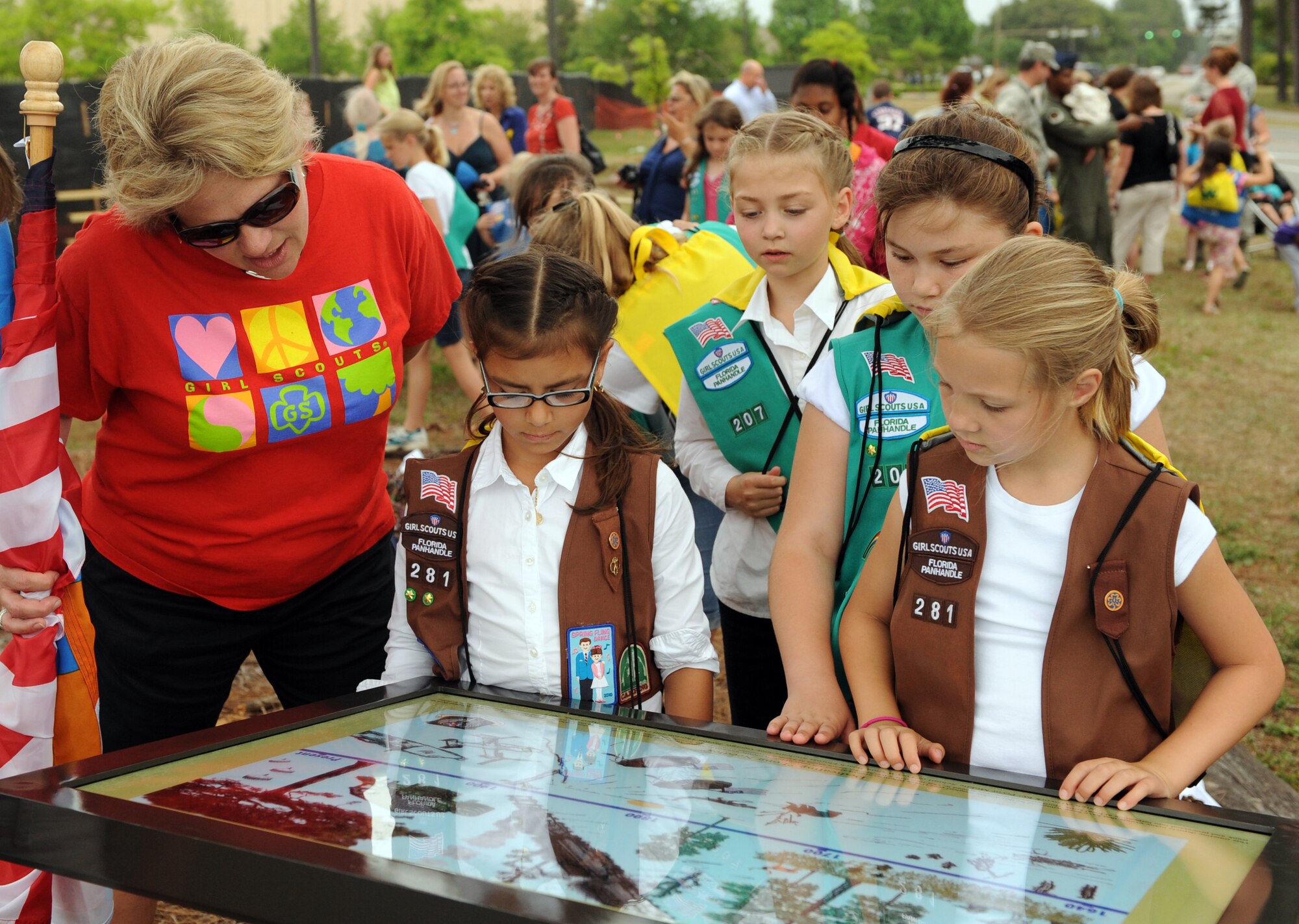 Girl Scouts from Troop 207 read an educational sign about the lifecycle of the long-leaf pine tree at the Arbor Day celebration, Hurlburt Field, Fla., April 27, 2011. Arbor Day is an observance that encourages the planting, care and preservation of trees.This year, Hurlburt Field dedicated a 375 year-old Longleaf Pine tree located at the intersection near the base clinic. (U.S. Air Force photo by Airman 1st Class Caitlin O’Neil-McKeown/Released)



