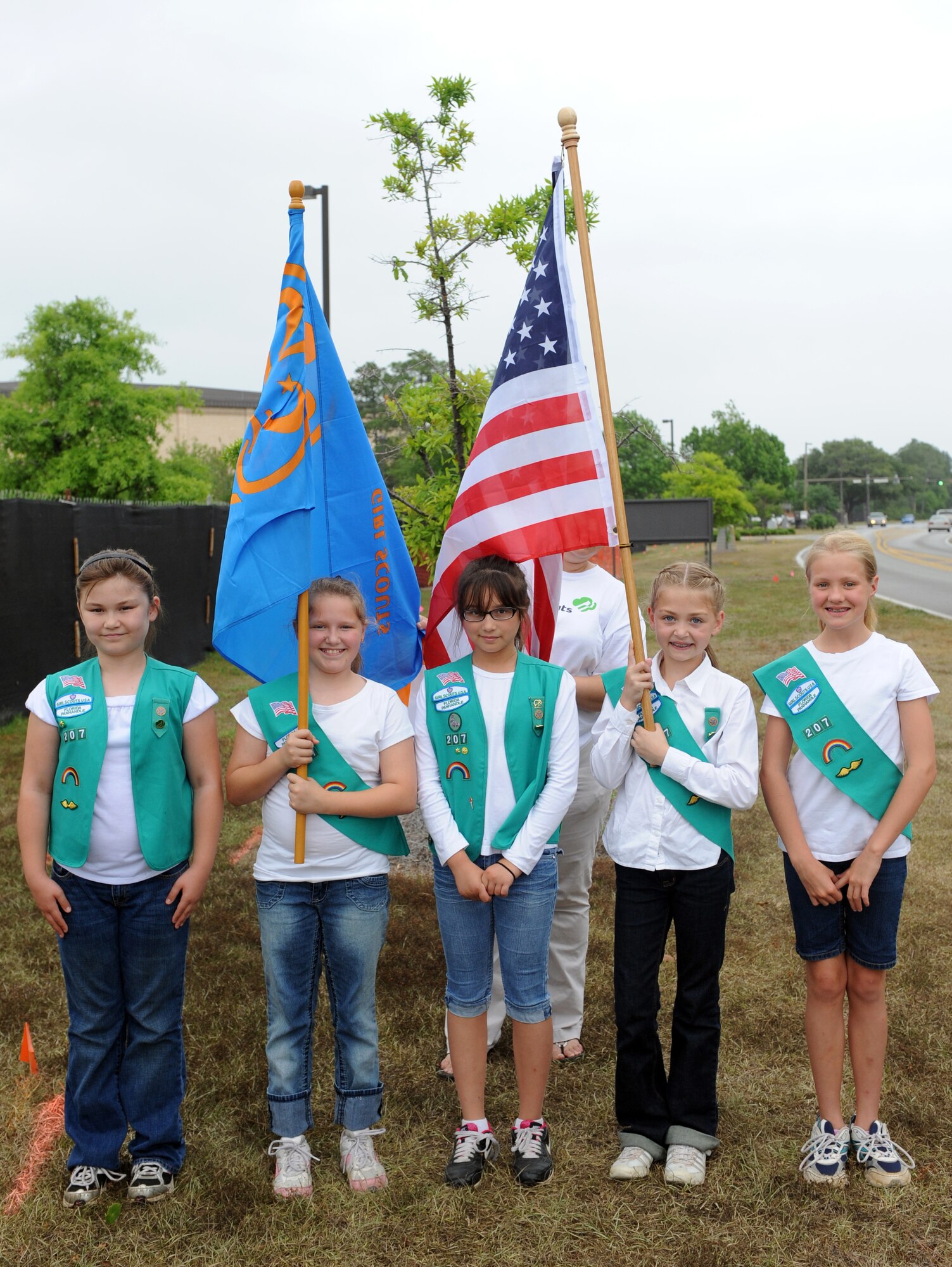 Members of Girl Scout Troop 207 present the colors at the annual Arbor Day celebration, Hurlburt Field, Fla., April 27, 2011. Arbor Day is an observance that encourages the planting, care and preservation of trees. This year, Hurlburt Field dedicated a 375 year-old Longleaf Pine tree located at the intersection near the base clinic. (U.S. Air Force photo by Airman 1st Class Caitlin O’Neil-McKeown/Released)


