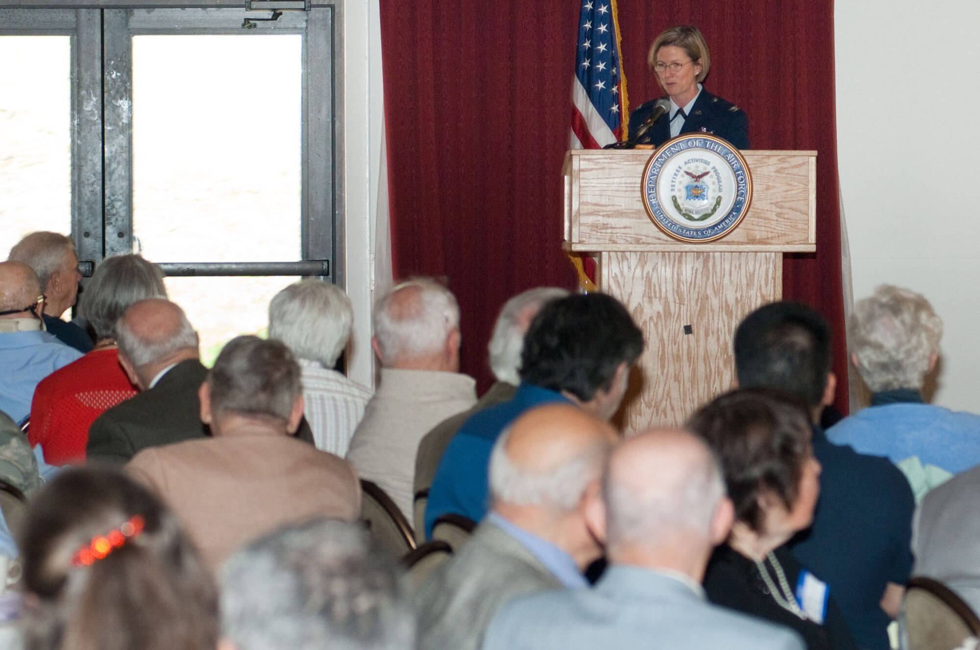 HANSCOM AIR FORCE BASE, Mass. – Col. Stacy L. Yike, 66th Air Base Group commander, speaks to retirees during a Military Retiree Day luncheon at the Minuteman Club April 30. In addition to the luncheon, retirees were able to meet with a variety of retiree services representatives during an information fair. (U.S. Air Force photo by Rick Berry) 