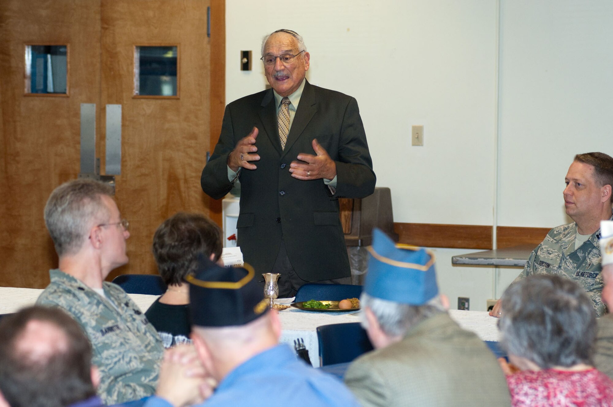 HANSCOM AIR FORCE BASE, Mass. – Rabbi Abraham Morhaim (standing) explains the meaning and purpose of the Passover Seder during the Passover Seder Exploration at the Base Chapel April 29. The Hanscom Jewish Group invited personnel to learn about Passover and enjoy an Israeli-style lunch. (U.S. Air Force photo by Rick Berry)
