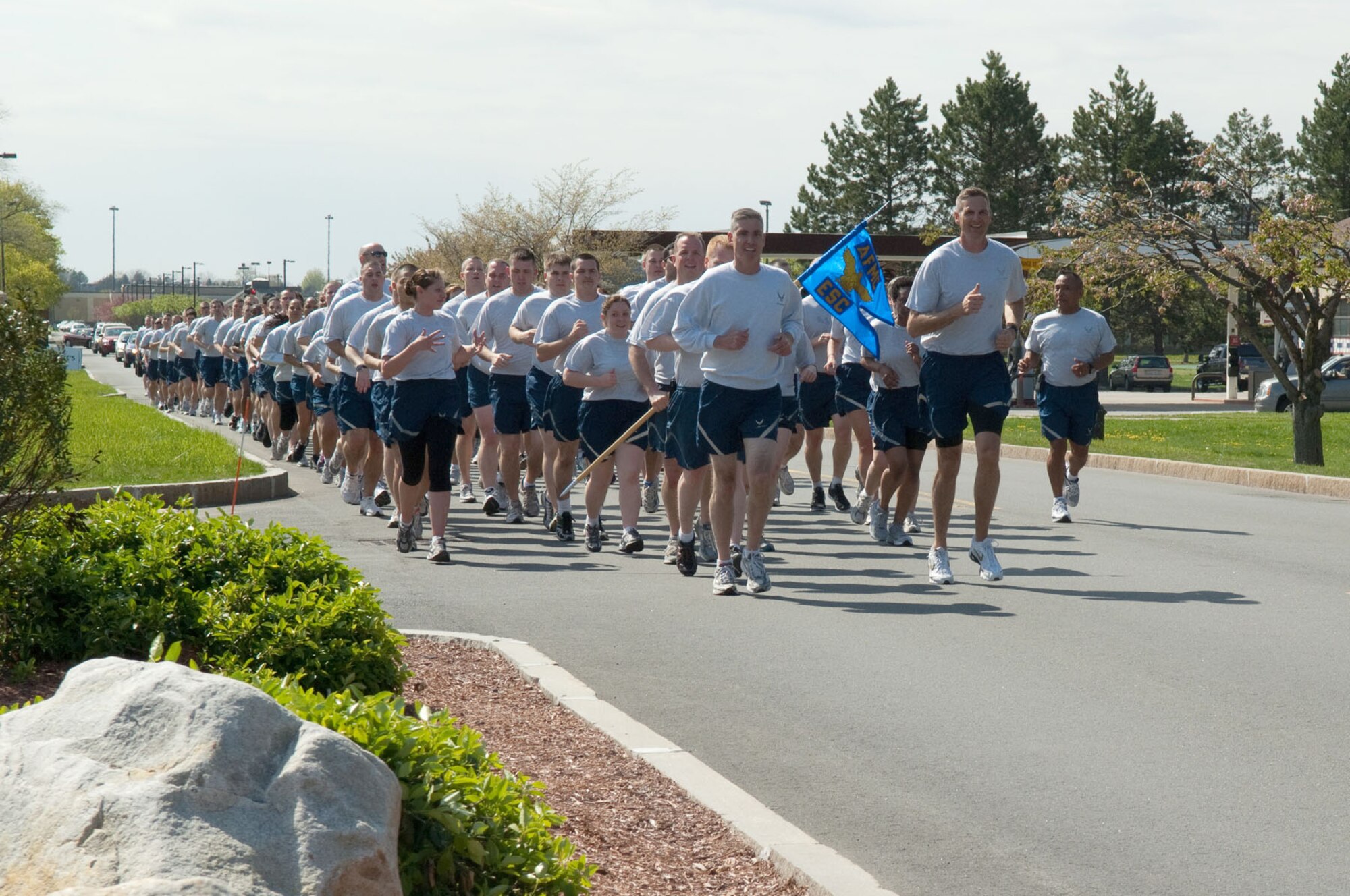HANSCOM AIR FORCE BASE, Mass. – Col. Mark Spillman, Electronic Systems Center vice commander, and Col. John Drohan, ESC chief of staff, lead the formation run as part of the opening ceremonies for the Hanscom Olympics May 2. Olympic activities wrap up May 6. (U.S. Air Force photo by Rick Berry)