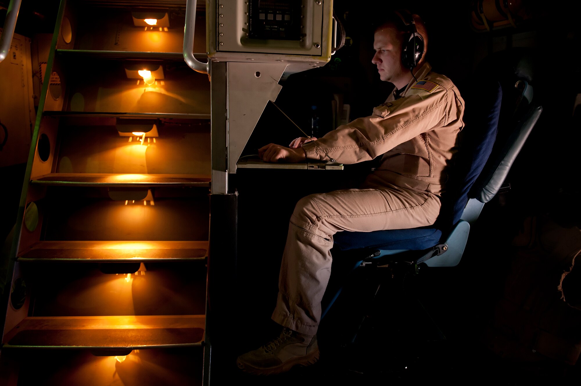Staff Sgt. Todd Tichawa, 816th Expeditionary Airlift Squadron, splits his time on this deployment between his duties as a loadmaster and pursuing his degree in business administration. (U.S. Air Force photo/Master Sgt. Adrian Cadiz)