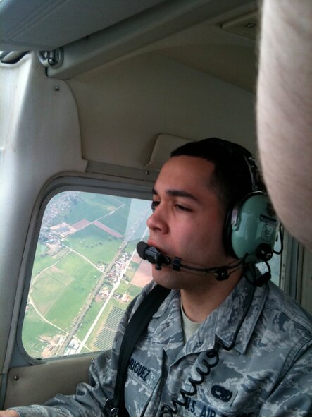 Airman 1st Class Cory Rodriguez enjoys his incentive flight in a Cessna 172 aircraft  provided by the Coleman Aero Club. (U.S. Air Force Photo by Lt. Col. Rich Radvanyi)