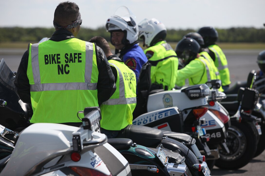 Marine Corps Auxiliary Landing Fields Bogue Field, N.C. – Participants of the Bike Safe Ride, return from their course with local law enforcement officers, aboard Marine Corps Auxiliary Landing Fields Bogue Field, May 6. Officers observed their driving on open roads and assessed their skills as motorcycle drivers.