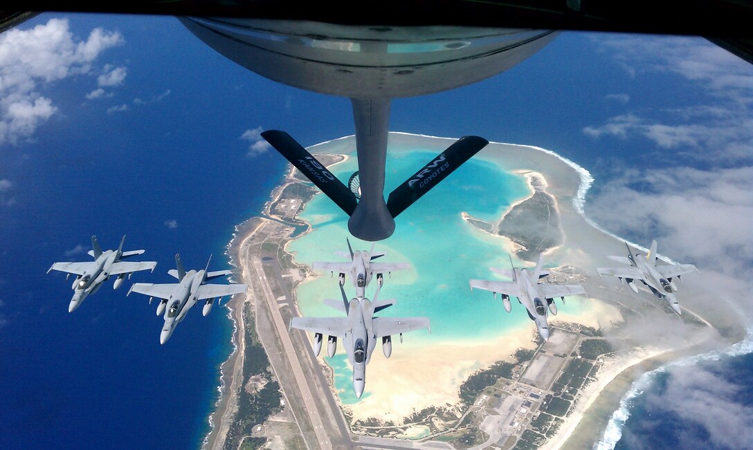 A 190th KC-135 prepares to refuel F- 18s over Wake Island during an escort
mission from Japan to the United States. (photo by SSgt. Ben Fulton)