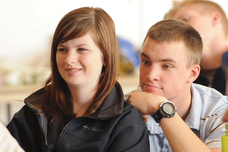 A couple participating in the marriage preparation and relationship enhancement workshop at the Academy listens to a presentation by a Behavioral Sciences faculty member. (Photo by Mike Kaplan)