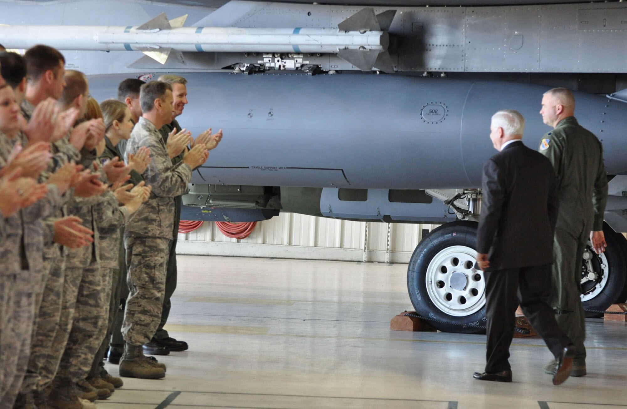Secretary of Defense Robert Gates walks by Col. Patrick Doherty and Col. Randy Ogden May 6, 2011, after making remarks to nearly 300 Airmen at Seymour Johnson Air Force Base, N.C. Colonel Doherty is the 4th Flying Wing commander, and Colonel Ogden is the 916th Air Refueling Wing commander. (U.S. Air Force photo/Maj. Shannon Mann) 
