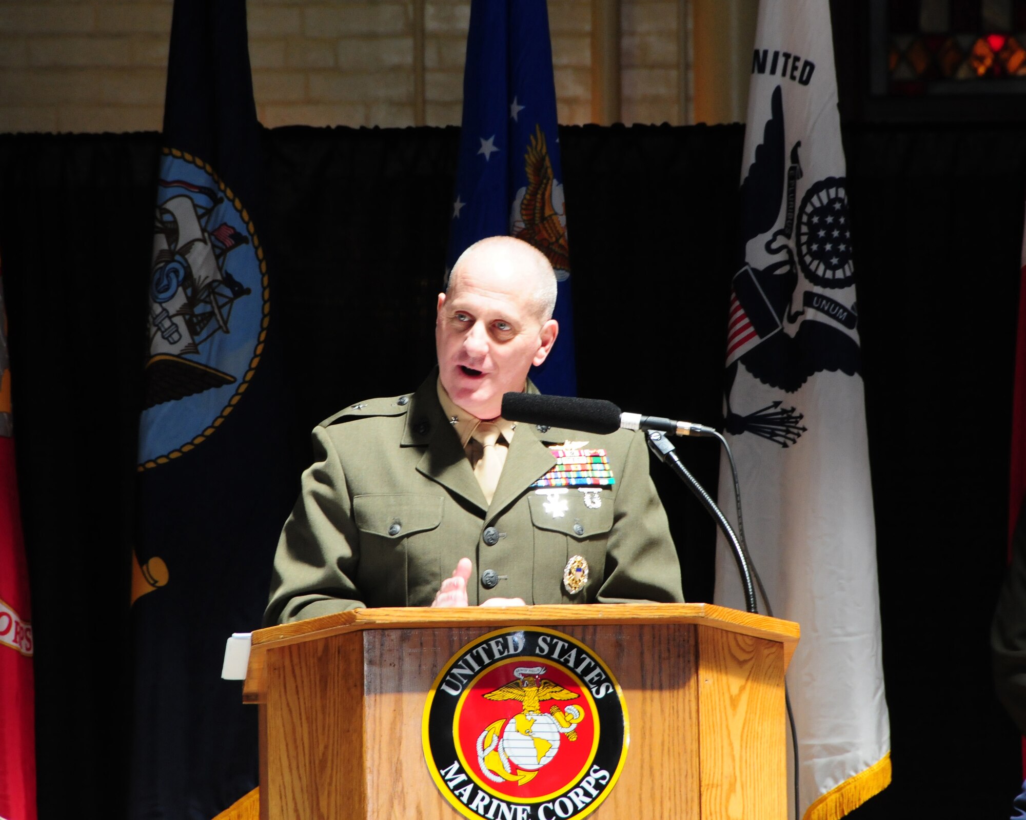 BUFFALO, N.Y.- Marine Corps Brigadier General Steven W. Busby, Deputy Director for Force Management, Application and Support Joint Staff, J-8 spoke to a full house of military and civilian  audience about current events, the Marine Corps and the military.  Brig.Gen. Busby was the invited guest speaker for the 51st Annual Armed Forces Week Luncheon which was hosted this year by the Marines. (U.S. Air Force Reserve photo by Peter Borys)