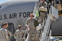 Airmen of the 916th Air Refueling Wing are welcomed home by their families upon their return in supporting operations over Libya. (USAF photo by Maj. Shannon Mann, 916ARW/PA)