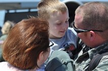 Airmen of the 916th Air Refueling Wing are welcomed home by their families upon their return in supporting operations over Libya. (USAF photo by Maj. Shannon Mann, 916ARW/PA)