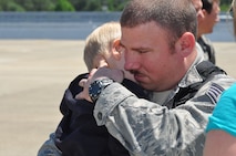 Airmen of the 916th Air Refueling Wing are welcomed home by their families upon their return in supporting operations over Libya. (USAF photo by Maj. Shannon Mann, 916ARW/PA)