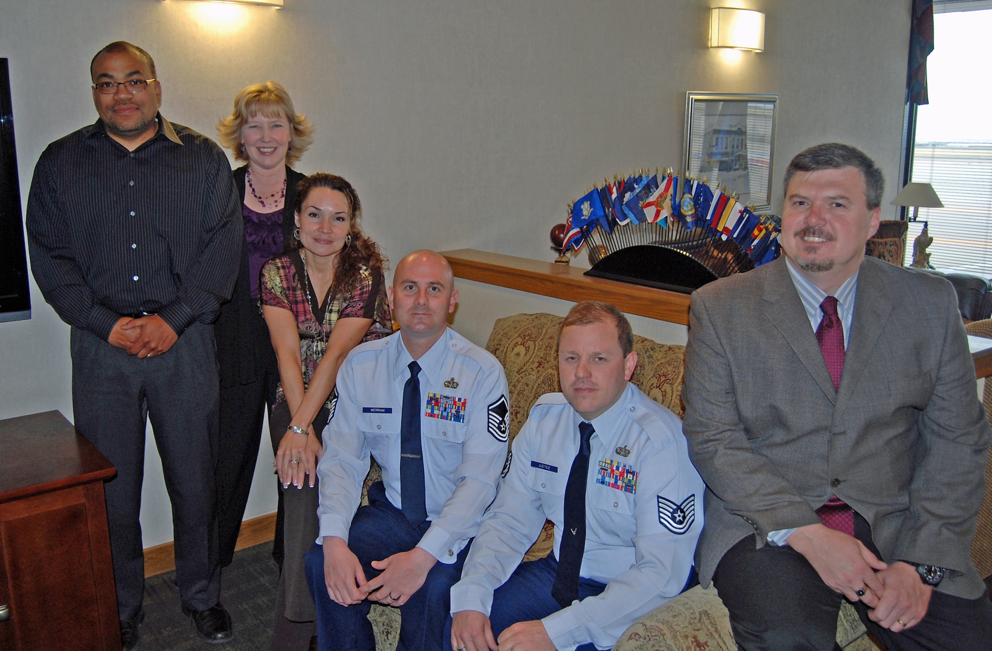 The 21st Space Wing Protocol Office on Peterson Air Force Base received the Air Force-level 2010 George Washington Award for Protocol Excellence. From left,  Steven Daniels, Francine Norrod, Elisha Olivas-Stewart, Master Sgt. Jason Merriam, Tech. Sgt. Scott Justice and Kenneth Friesz. (U.S. Air Force photo/Airman 1st Class Jessica Hines)