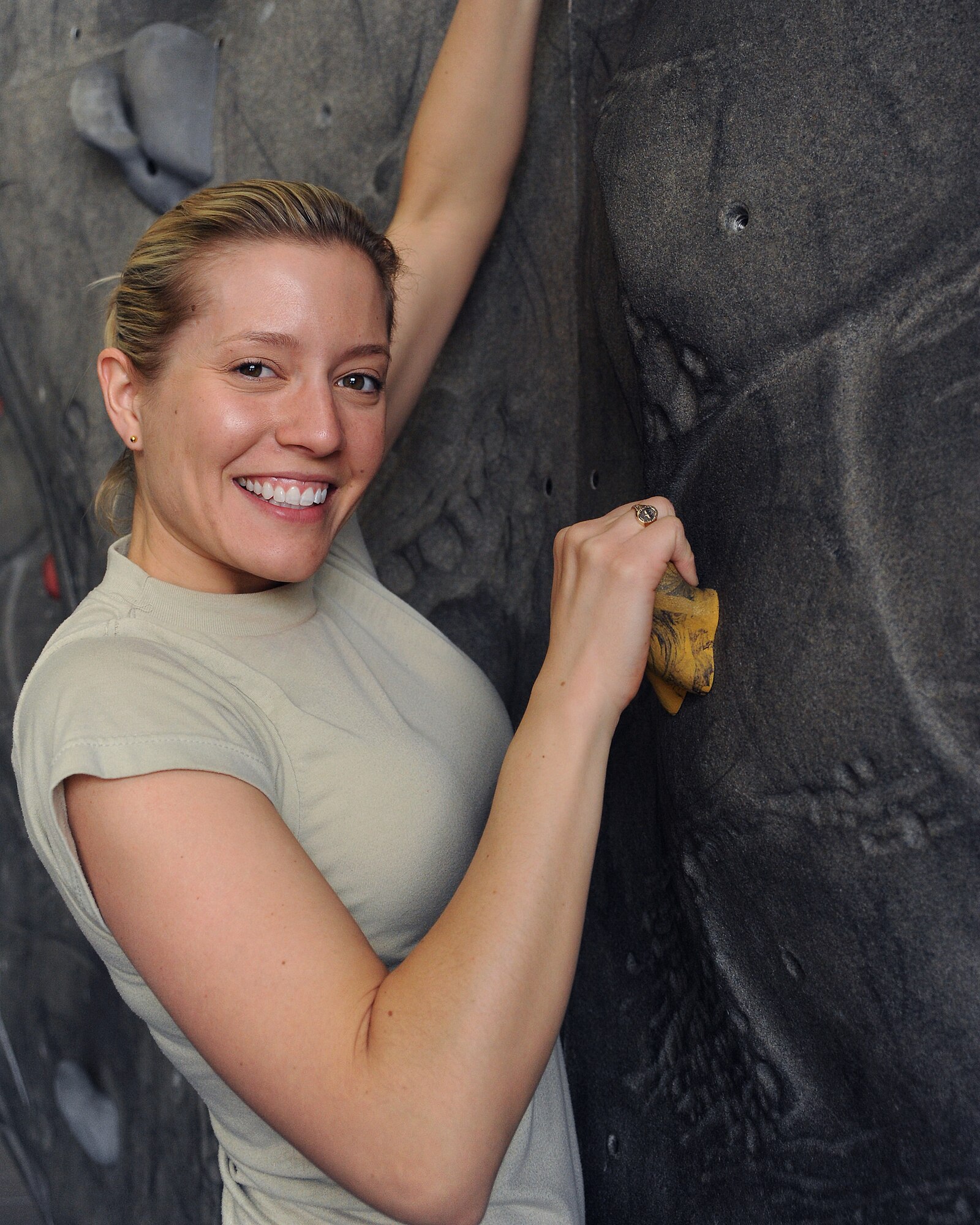 2nd Lt. Anna Hall, 319th Operations Support Squadron, poses at the rock climbing wall May 4 at the fitness center here. Hall was named Grand Forks Air Force Base female Athlete of the Year for 2010. Nominations are made based on outstanding performance in sports and fitness, assigned duties and performance in the community. (U.S. Air Force photo by Airman 1st Class Amber Bennett) 