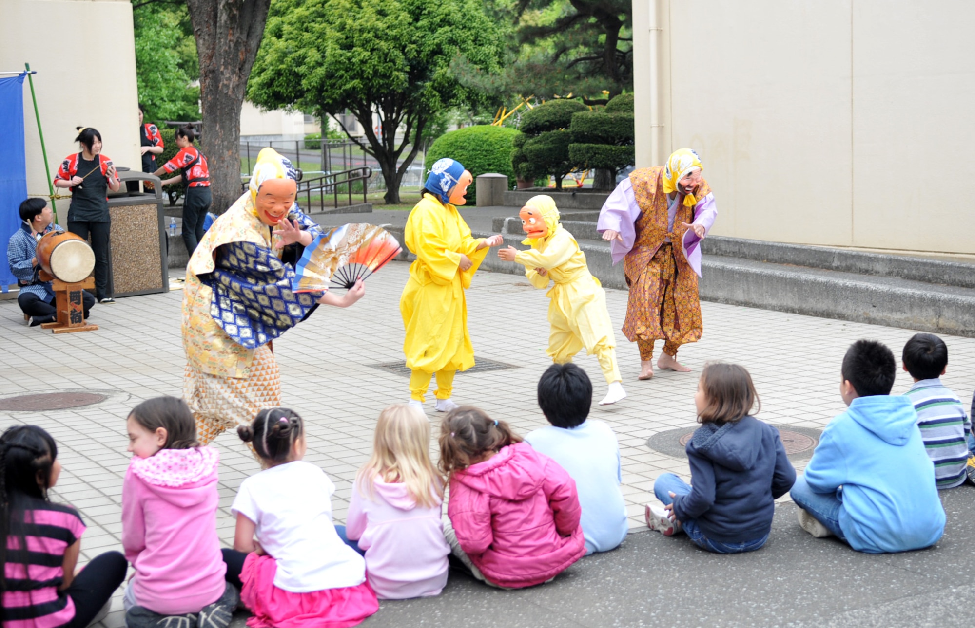 YOKOTA AIR BASE, Japan -- Ohayashi Dancers perform for students at Yokota West Elementary School, Yokota Air Base, Japan, May 5, 2011. The dancers shared part of the Japanese culture with students during the multicultural event. (U.S. Air Force photo/Airman 1st Class Krystal M. Garrett) 


