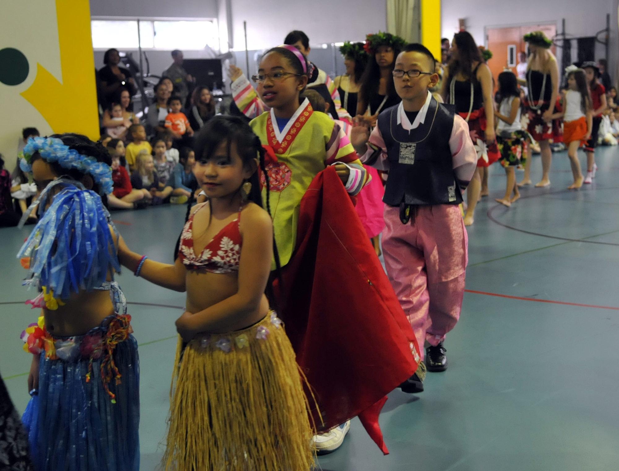 YOKOTA AIR BASE, Japan -- Yokota West Elementary students participate in a fashion show during a multicultural event at Yokota Air Base, Japan, May 5, 2011. Students wore traditional clothing representing several nationalities. (U.S. Air Force photo/Airman 1st Class Krystal M. Garrett)  
