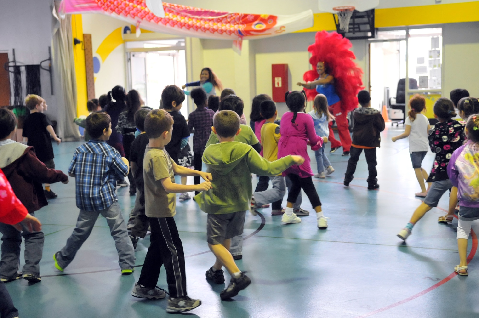 YOKOTA AIR BASE, Japan -- Kindergarten students at Yokota West Elementary School participate in African and South American Zumba and Samba dance at Yokota Air Base, Japan, May 5, 2011. The school celebrated various heritages with a multicultural event. (U.S. Air Force photo/Airman 1st Class Krystal M. Garrett) 