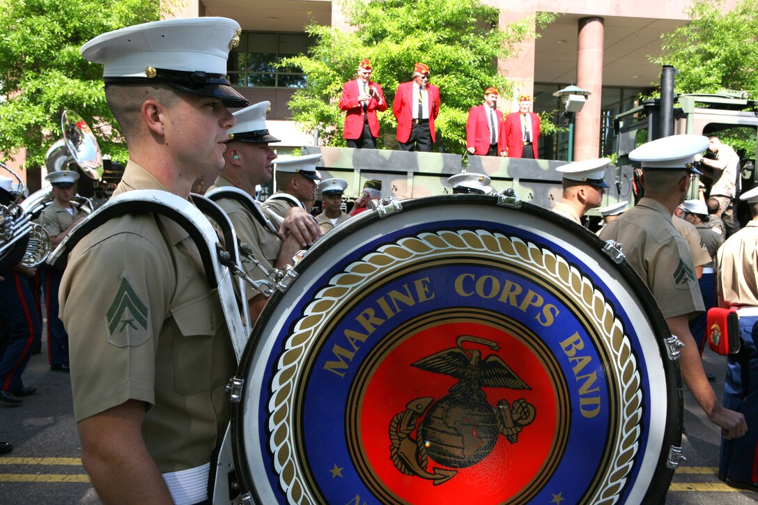 Cpl. Adam Atkins, the bass drummer for Marine Band New Orleans, stands ready to march in the Armed Forces Day Parade in Chattanooga, Tenn., May 6.  The band marched in the parade along with veterans of several conflicts.