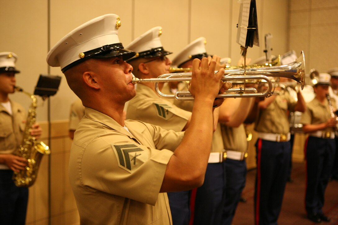 Cpl. Keith Cerrato, a trumpet player with Marine Band New Orleans, performs at a ceremony following the Armed Forces Day Parade in Chattanooga, Tenn., May 6.