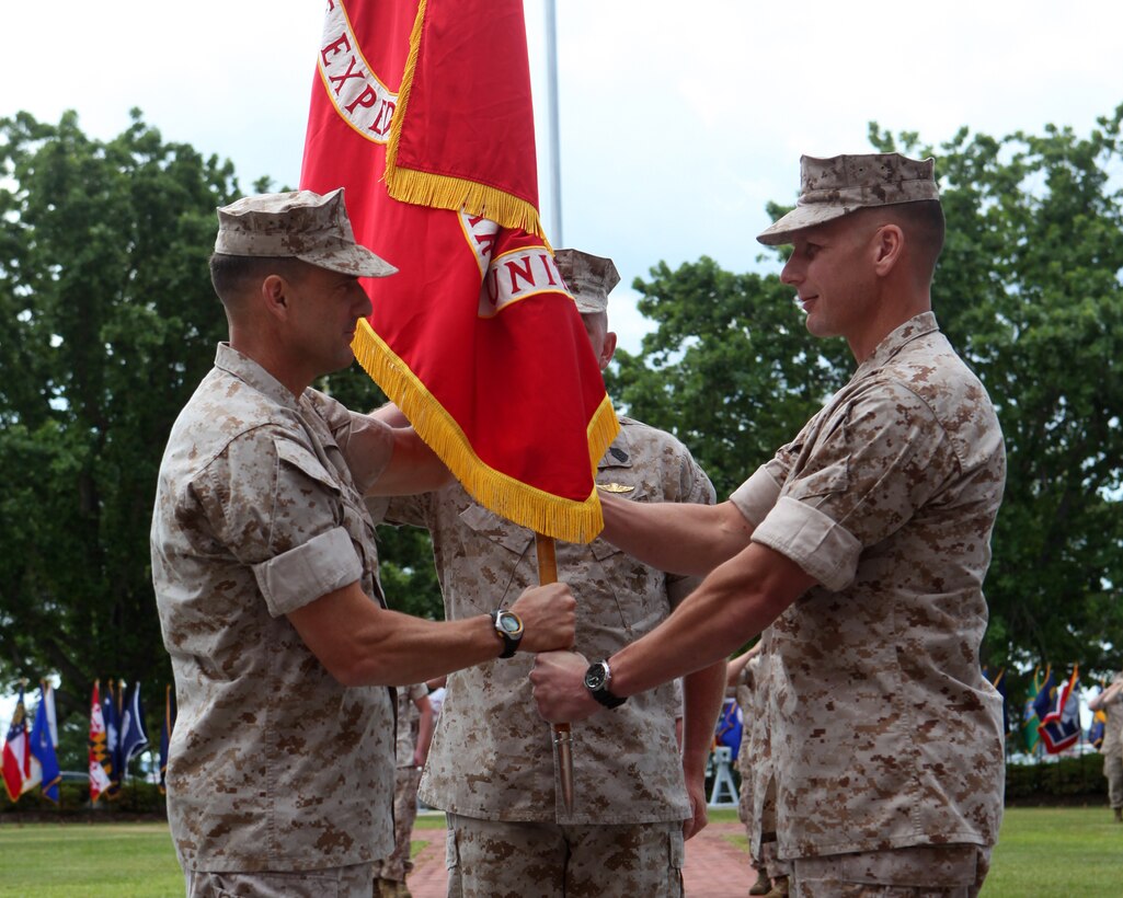 Colonel Frank Donovan takes command of the 24th Marine Expeditionary Unit from Lt. Col. Jason Waldron during an assumption of command ceremony in front of II Marine Expeditionary Force Headquarters  on Camp Lejeune, N.C. May 6, 2011.