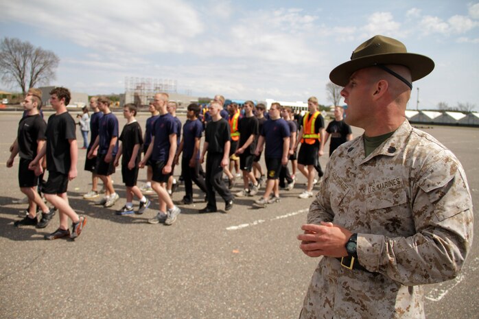 Senior drill instructor Staff Sgt. Brody V. Goldthwaite, 27, from St. Charles, Ill., teaches Recruiting Substation Mankato basic drill movements during the Recruiting Station Twin Cities mini boot camp May 7. For additional imagery from the event, visit www.facebook.com/rstwincities.