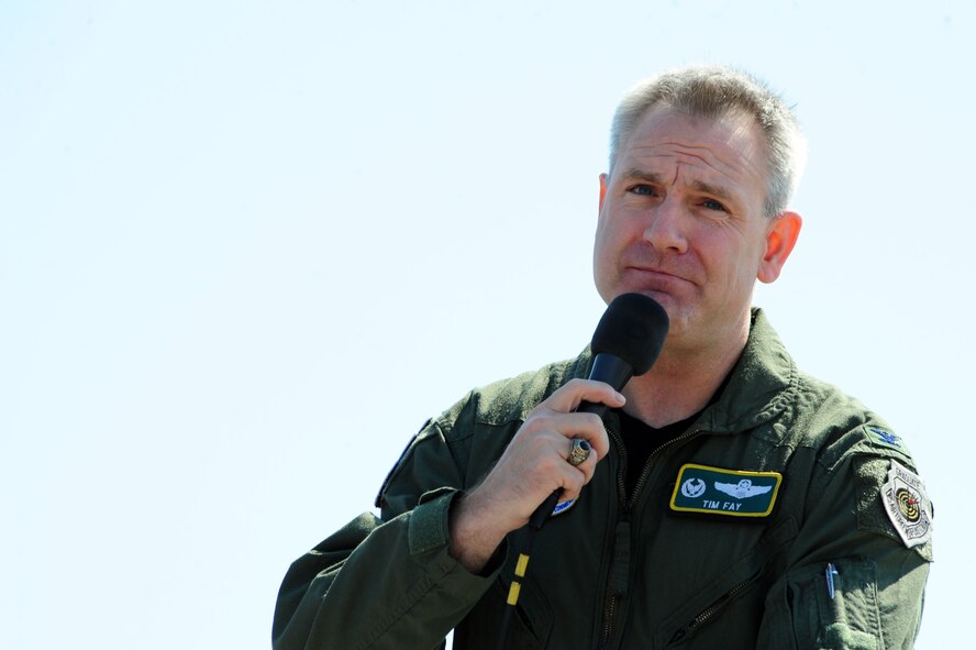 Col. Tim Fay, 2nd Bomb Wing commander addresses the 2011 Defenders of Liberty crowd during the opening ceremony at Barksdale Air Force Base, La., May 7. This year's air show acts include the A-10 Demonstration Team and Tora Tora Tora. (U.S. Air Force photo/Senior Airman Joanna M. Kresge)