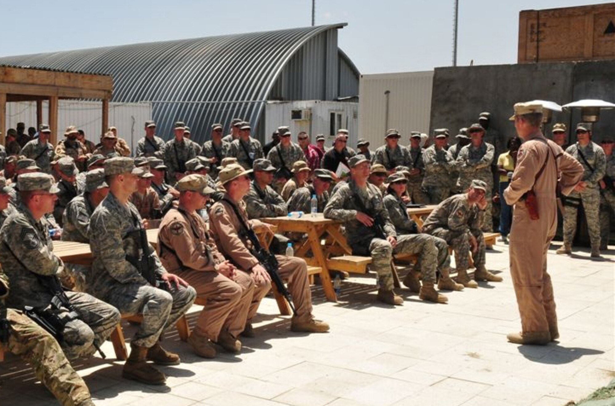 KABUL, Afghanistan – Lt. Gen.  Mike Hostage, Commander, U.S. Air Forces Central Command, addresses Airmen while visiting the 438th Air Expeditionary Wing.  General Hostage answered questions from coalition force members, toured the base and visited with senior leaders. (U.S. Air Force photo by Tech. Sgt. Brian E. Christiansen)