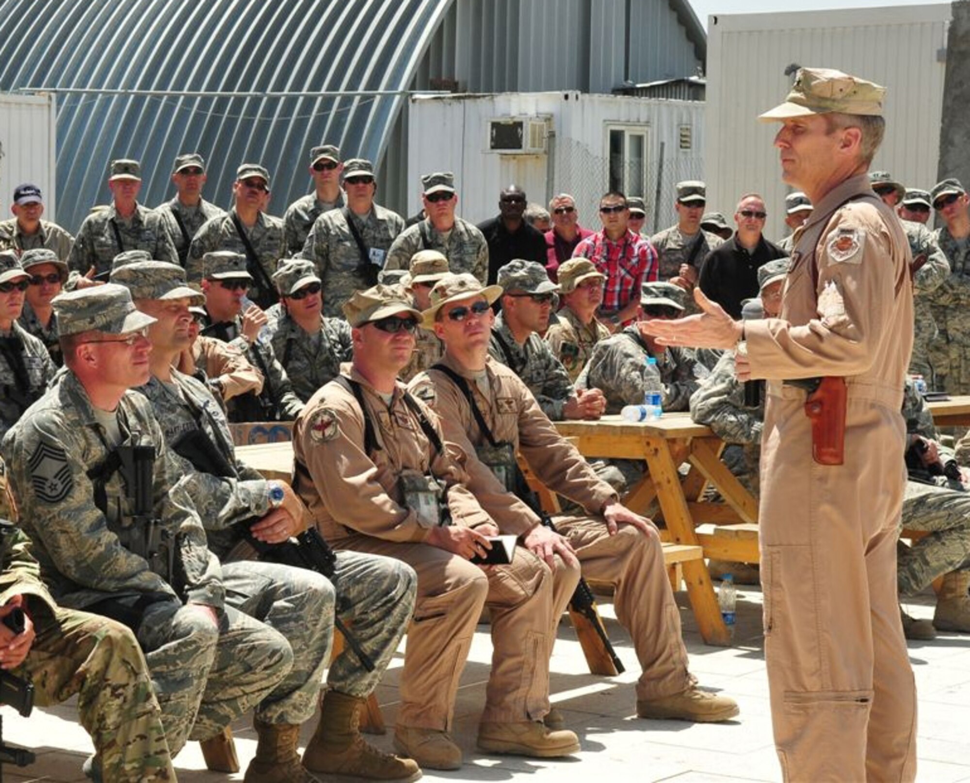 KABUL, Afghanistan – Lt. Gen.  Mike Hostage, Commander, U.S. Air Forces Central Command, addresses Airmen while visiting the 438th Air Expeditionary Wing.  General Hostage answered questions from coalition force members, toured the base and visited with senior leaders. (U.S. Air Force photo by Tech. Sgt. Brian E. Christiansen)