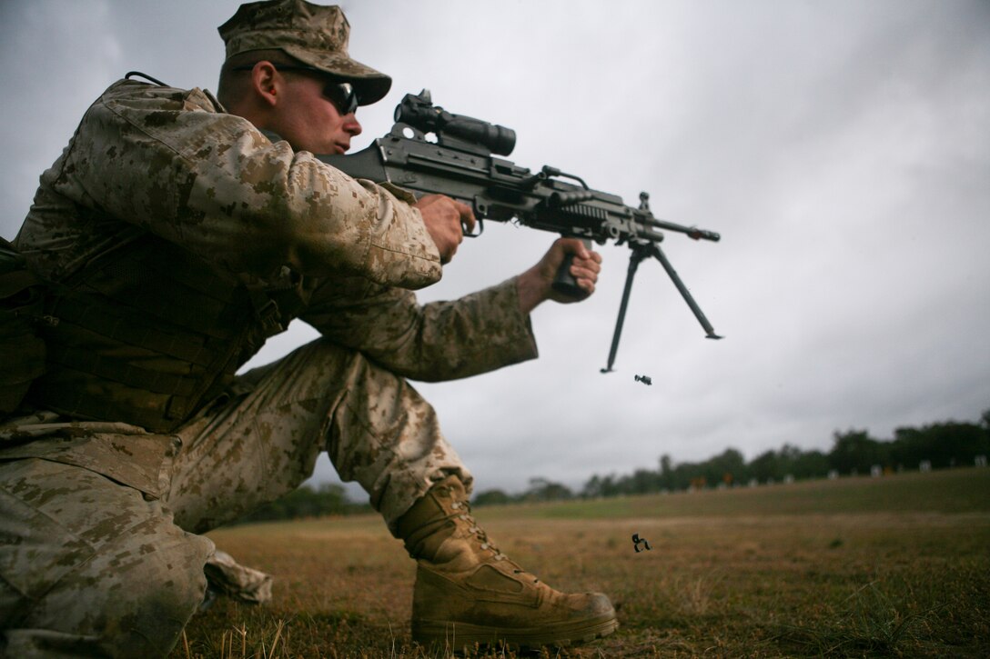 Cpl. Duane Kamp, mortarman, 3rd Battalion, 3rd Marine Regiment, 3rd Marine Division, III Marine Expeditionary Force, fires on a target from the kneeling position during a competition here May 13 at the 2011 Australian Army Skill at Arms Meeting.  The week-long meeting pit military representatives from partner nations in competition through a series of grueling combat marksmanship events. Represented nations include Canada, France (French Forces New Caledonia), Indonesia, Timor Leste, Brunei, Netherlands, U.S., Papua New Guinea, New Zealand, Singapore, Malaysia, Thailand as well as a contingent of Japanese observers. (U.S. Marine Corps Photo by Lance Cpl. Mark W. Stroud/Released)