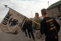 Austin Sutter, a 17-year-old senior at Farmington High School, carries one of Recruiting Substation Burnsville's guidons during the Recruiting Station Twin Cities mini boot camp moto run May 8. Sutter was enlisted by his father Gunnery Sgt. Joe Sutter, 38, from Rosemount, Minn., and became a member of the Delayed Entry Program on Oct. 7, 2010. He ships off to boot camp on June 20. For additional imagery from the event, visit www.facebook.com/rstwincities.