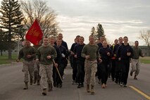 Recruiting Station Twin Cities Commanding Officer Maj. Kenneth Gawronski, 35, from Liberty, Mo., and Sgt. Maj. James Kirkland, 44, from Mendota Heights, Minn., lead the mini boot camp moto run May 8 with Recruiting Substation Woodbury and 13 other stations following behind. More than 600 high school and college students from Minnesota, Wisconsin and the Dakotas attended the three-day training evolution. For additional imagery from the event, visit www.facebook.com/rstwincities.