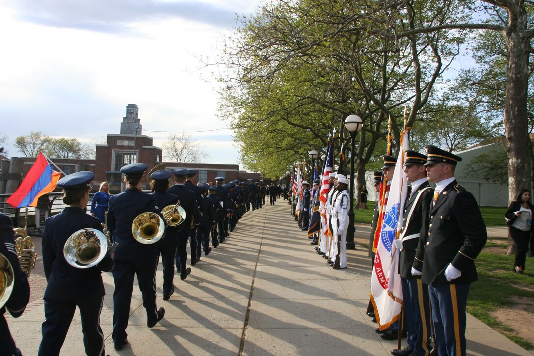 Ellis Island, NY: The ANG Band of the Northeast marches past the honor guards of the Armed Services.  The Band supported the Ellis Island Freedam Medals ceremony on May 7, 2011. (MA ANG Photo/MSgt Thomas Moriarty)