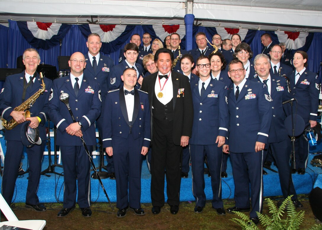 Entertainer Wayne Newton spent some time with members of the ANG Band of the Northeast after the 2011 Ellis Island Awards Ceremony in New York.  Mr. Newton praised the band for their musicianship and service.(MA ANG Photo/MSgt Thomas Moriarty)