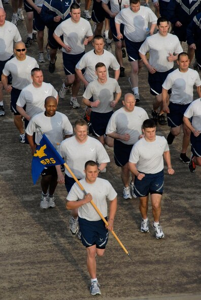 Airmen at Osan participate in a fun-run and foreign object damage walk around the flightline here May 6. The run and FOD walk were sponsored by Air Force Assistant Fund coordinators. The event was used to congratulate the base on an exceptional fund raiser, which brought in more than $153,000 dollars this year. (U.S. Air Force photo/Senior Master Sgt. Paul Holcomb)