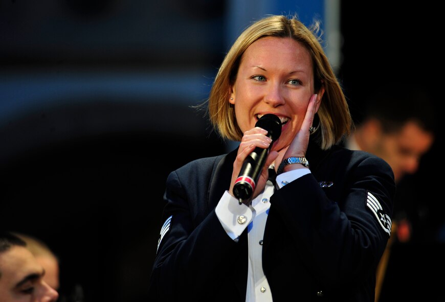 U.S. Air Force Staff Sgt. Rachel Trimble, vocalist and operations representative with the United States Air Forces in Europe Band, sings "I Feel Pretty" during a concert, Brno, Czech Republic May 2, 2011. The USAFE concert band is on tour through three countries, performing at seven locations as part of a building partnerships capacity and community outreach initiative. (U.S. Air Force Photo by Tech Sgt. Jocelyn L. Rich)