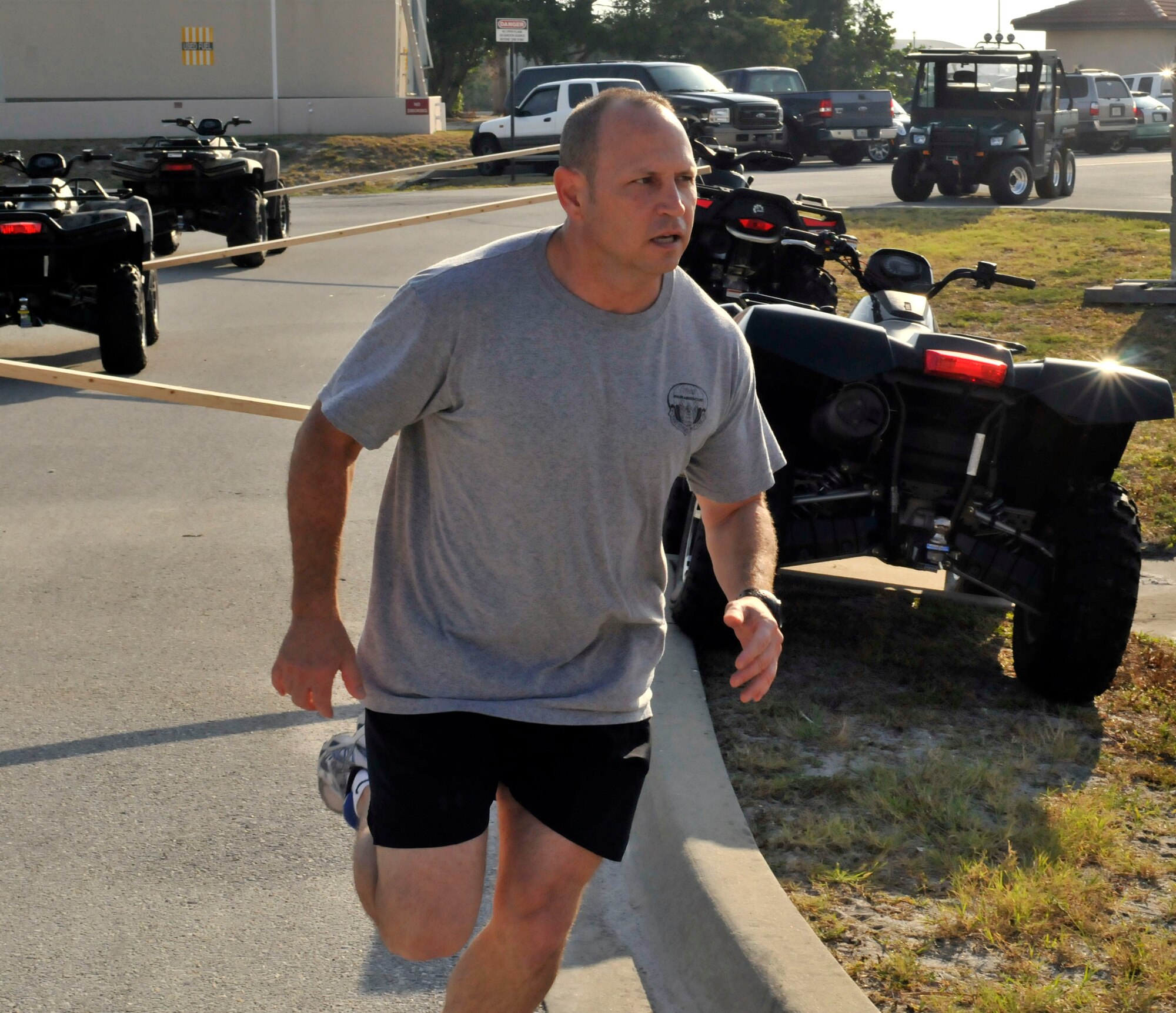 PATRICK AIR FORCE BASE, Fla - Lt. Col. Kurt Matthews, 308th Rescue Squadron Commander, runs through an obstacle course fashioned for a hands-on training event during the 920th Rescue Wing's drill training weekend here May 8, 2011. (U.S. Air Force photo/Capt. Ryan Liss)