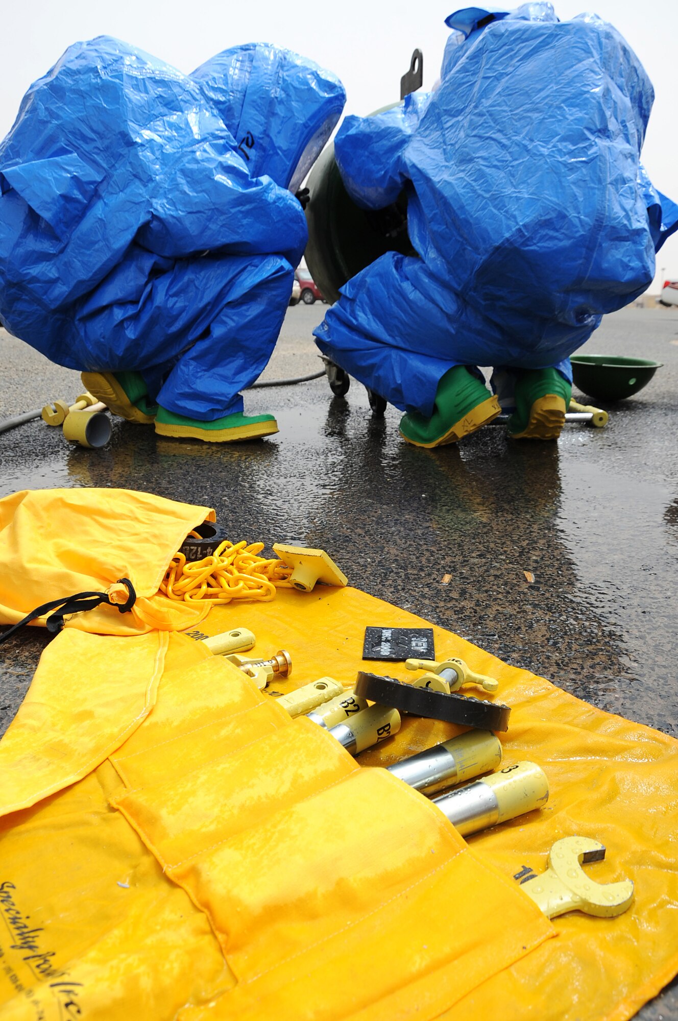 Firefighters with the 386th Expeditionary Civil Engineer Squadron used real-world chlorine kits for their hazardous material technician training. Every tool in chlorine kits has a specific purpose and it is up to the technician to decide how to use them during the training.  (U.S. Air Force photo by Senior Airman Cynthia Spalding)